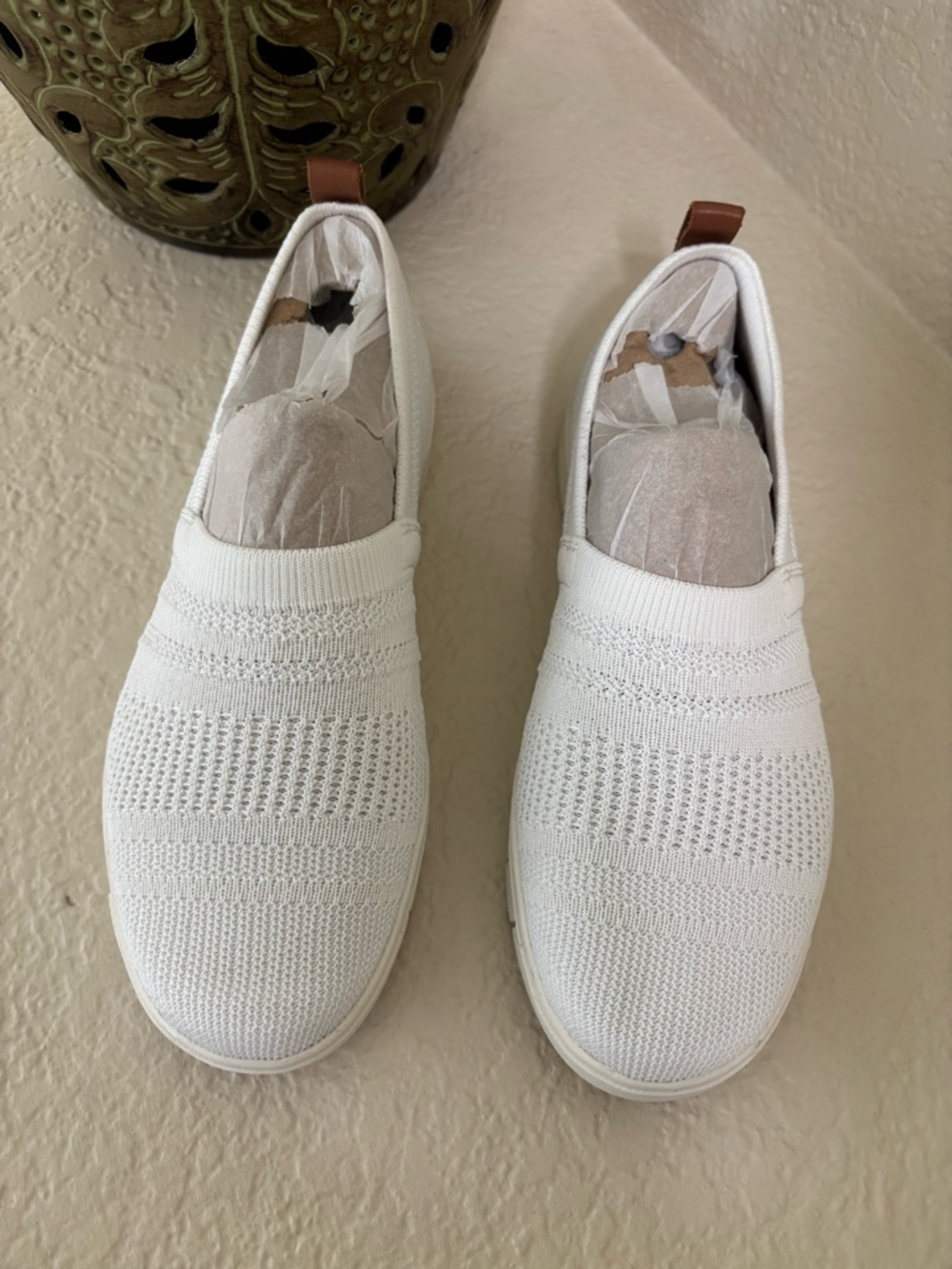 Ryka Ivory/White Slip-On Knit Sneakers with Brown Heel Tabs